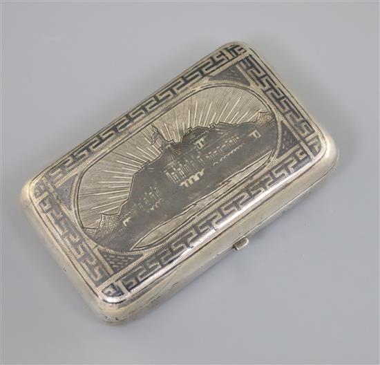 A late 19th century Russian 84 zolotnik silver and niello cigarette case, decorated with view of the Hermitage Museum